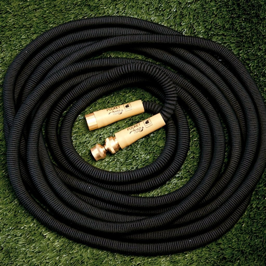 Pocket Hose Brass Bullet silo on a grass background